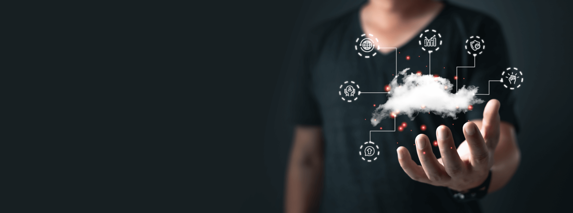 Person holds his hand open in front of him, on it is a cloud surrounded by icons.